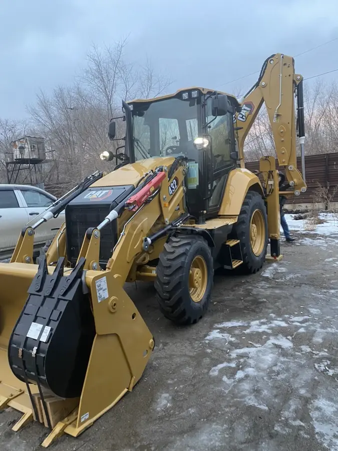 Экскаватор-погрузчик САТ