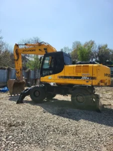 Экскаватор колесный с гидромолот ковш 1.4m3